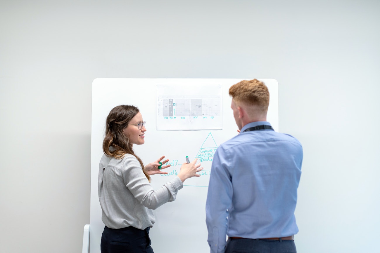 Young engineers whiteboard design