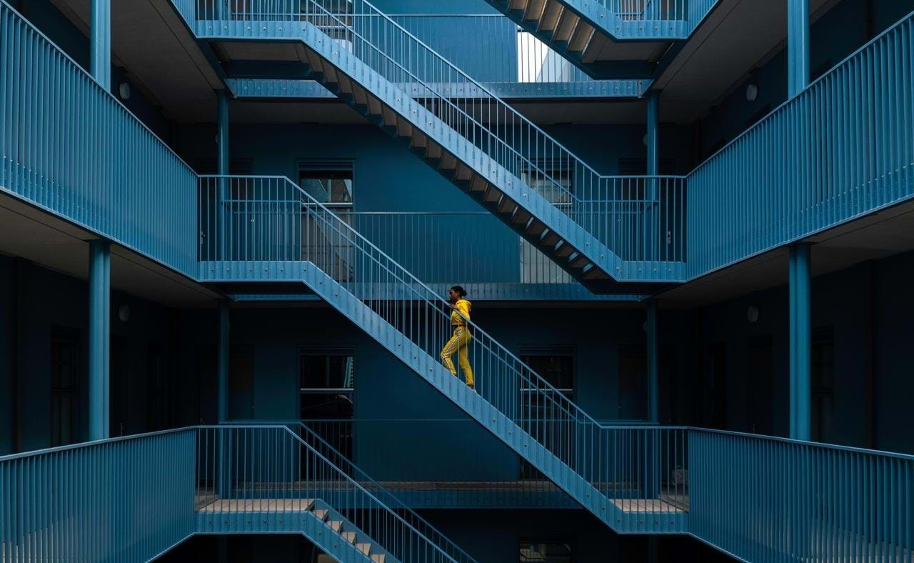 Woman going up stairway
